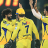 CSK Wicketkeeper after MS Dhoni celebrating a crucial moment with teammates during an IPL match.