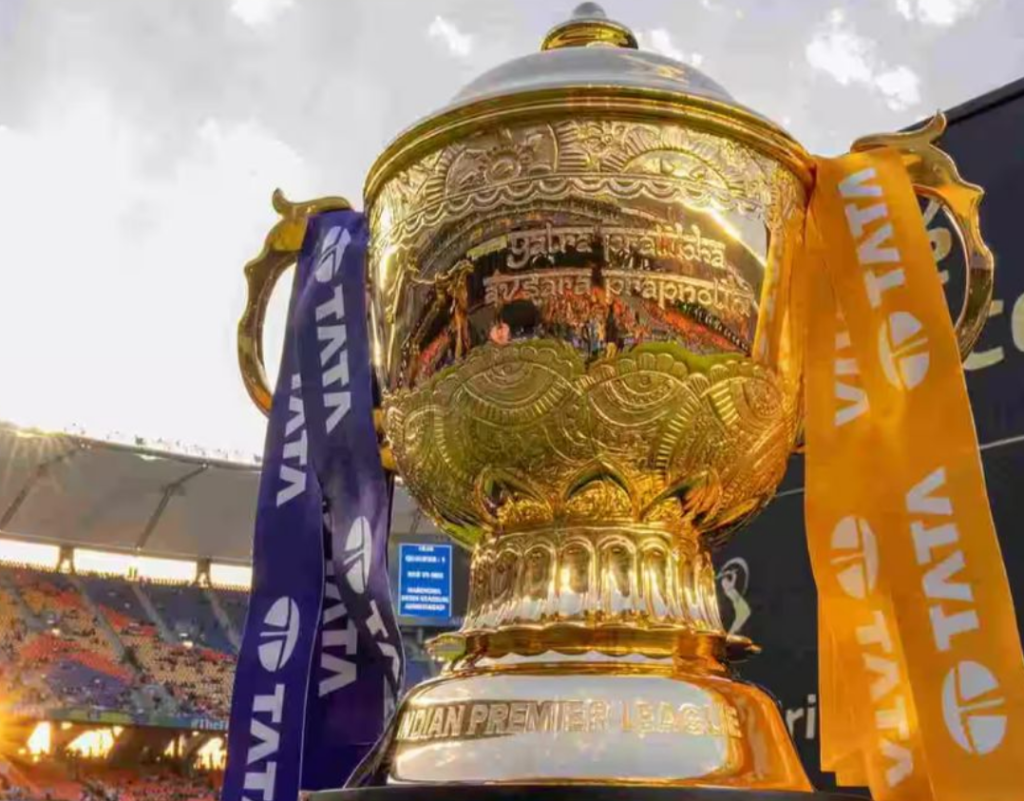 IPL 2025 Suspended tournament's golden trophy displayed with TATA branding.
