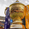 IPL 2025 Suspended tournament's golden trophy displayed with TATA branding.